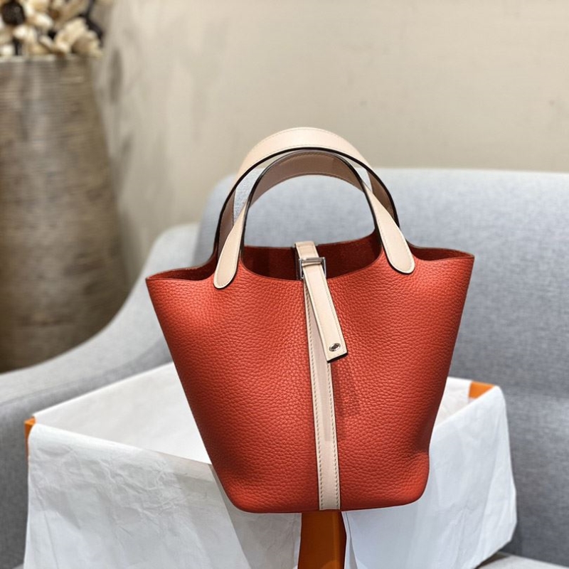H**mes shopping bags